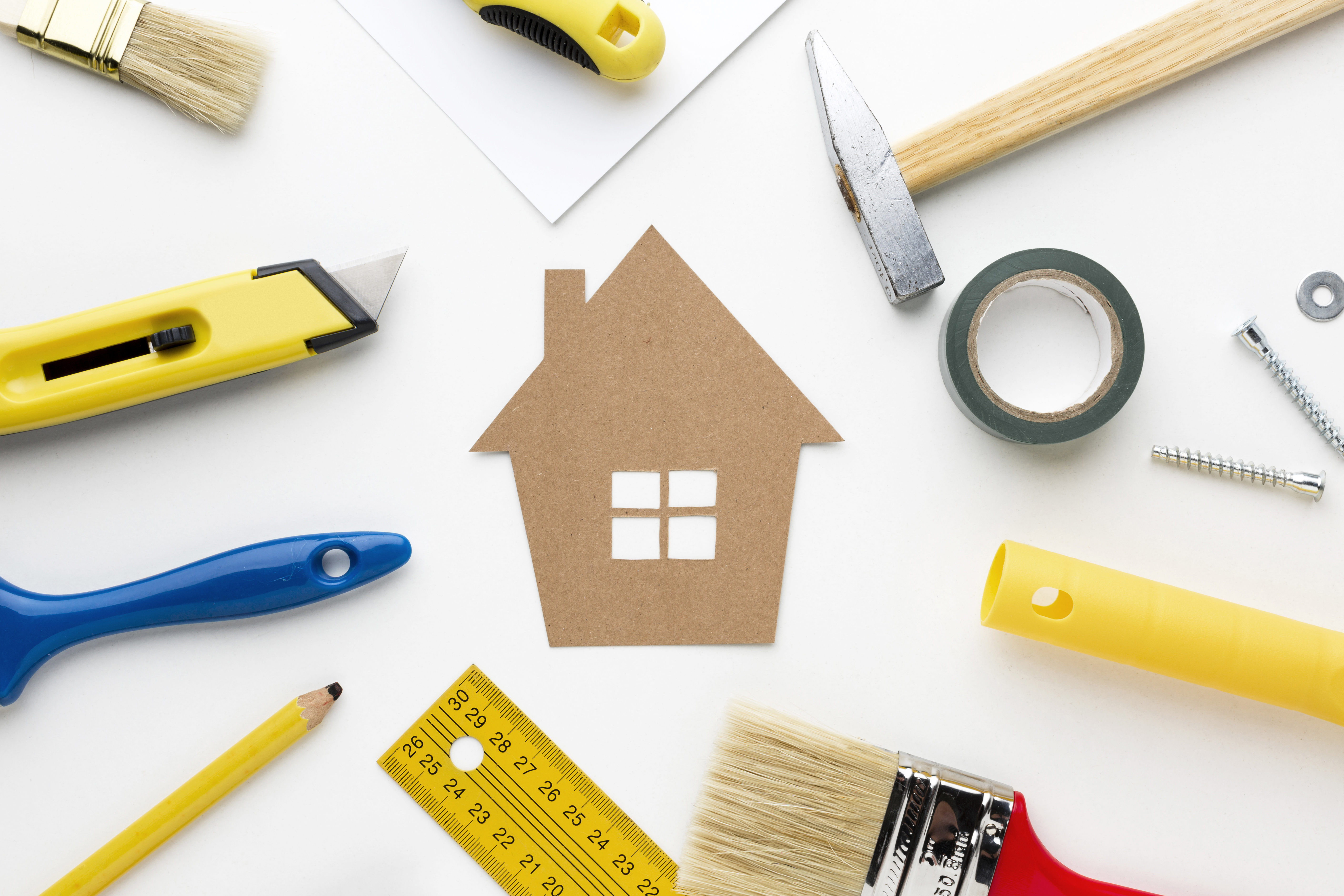 cardboard-house-surrounded-by-repair-tools